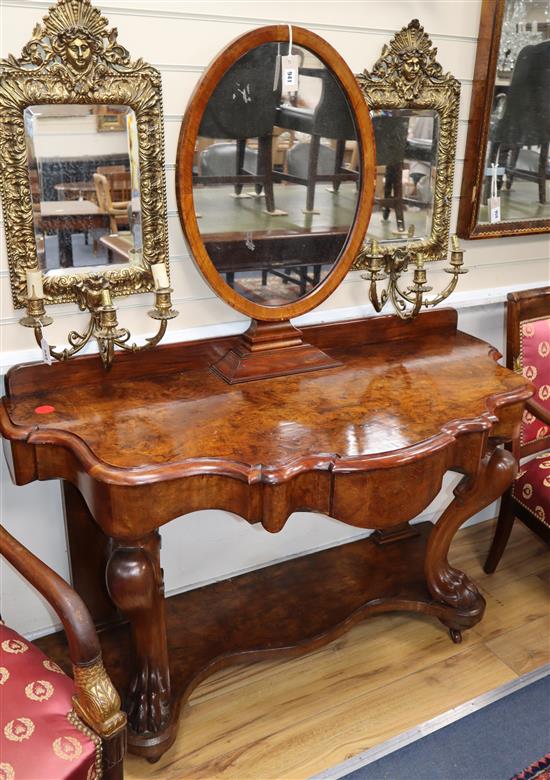A Victorian burr walnut serpentine fronted dressing table W.130cm